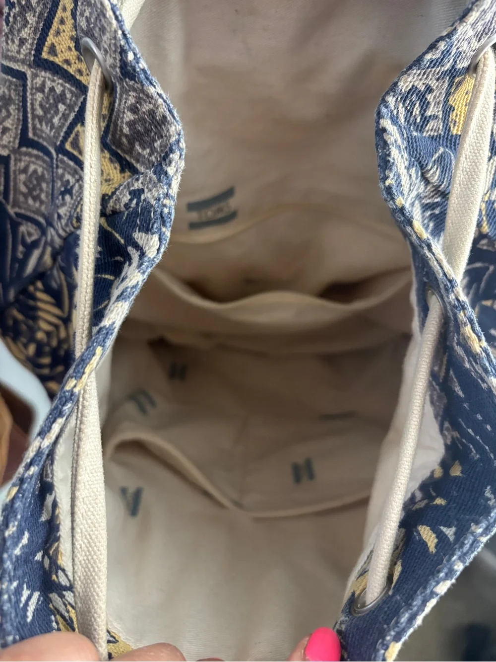Tom’s canvas backpack